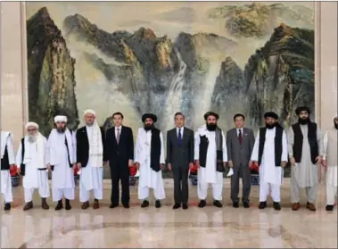  ??  ?? PRC’S State Councillor and Foreign Minister Wang Yi met a Taliban delegation in Tianjin, China on 28 July.