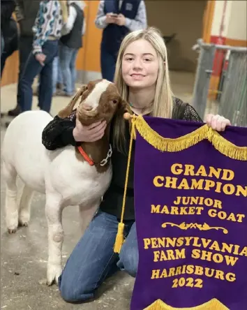  ?? Courtesy of Alexa Miles ?? Alexa Miles, 18, was named Grand Champion among competitor­s 8 to 19 years old for her market goat, Eddie.