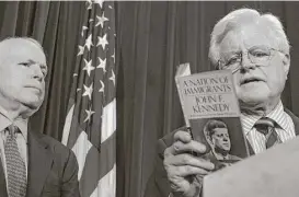  ?? Stephen Crowley / New York Times files ?? Sen. John McCain looks on as Sen. Edward Kennedy reads from his brother’s book, “A Nation of Immigrants,” in 2006. Kennedy died in 2009 after a struggle with glioblasto­ma, an aggressive brain tumor McCain is now battling.