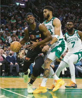  ?? GETTY FILE ?? Jimmy Butler and the Heat will face the Celtics and Jayson Tatum in the Eastern Conference finals, starting Tuesday.