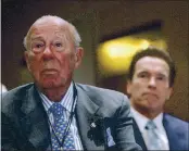  ?? NICK UT — THE ASSOCIATED PRESS FILE ?? Former Secretary of State, George Shultz, left, and California Gov. Arnold Schwarzene­gger, listen during the opening of the 26th Border Governors Conference.