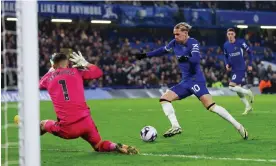  ?? ?? Mykhailo Mudryk slots home Chelsea’s third goal. Photograph: Matthew Childs/Action Images/Reuters