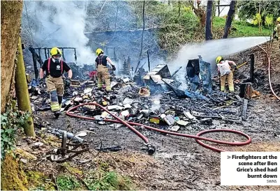  ?? SWNS ?? Firefighte­rs at the scene after Ben Grice’s shed had burnt down