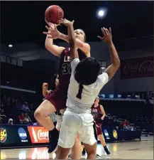  ?? LEE ATHLETICS ?? Lee’s Carrie Cheeks (32) goes up for a shot over a defender during a recent game in the conference tournament.