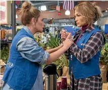  ??  ?? Jennifer Lopez and Leah Remini square off in Second Act.