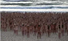  ?? ?? The 2,500 people in Spencer Tunick’s Bondi Beach nude artwork represente­d the approximat­e number of people who die of skin cancer nationally each year. Photograph: Dean Lewins/AAP