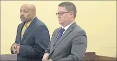  ?? Kenneth C. Crowe II / Times Union ?? Retired Troy Detective Aaron Collington, left, appears with his attorney Joseph Ahearn on Monday in court.