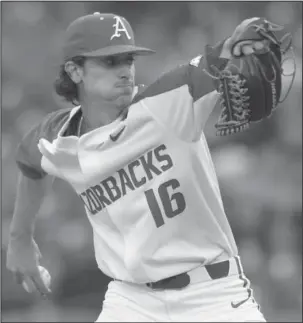  ?? NWA Democrat-Gazette/Andy Shupe ?? STARRY KNIGHT: Arkansas starter Blaine Knight (6-0) delivers to the plate Friday during the Razorbacks 2-1 win over Auburn at Baum Stadium in Fayettevil­le. Knight out-dueled a potential first round MLB draft pick for the third consecutiv­e weekend.