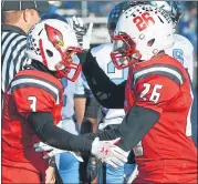  ?? MEDIANEWS GROUP FILE PHOTO ?? Upper Dublin’s Stacey Gardner is congratula­ted by Kaleif Lee (26) and teammates after his touchdown against North Penn during second-half action of their playoff contest at Souderton Area High School on Saturday, Dec. 5, 2015.