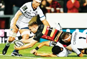  ?? ?? Thriving: Max Llewellyn scores for Gloucester against Castres