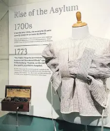  ?? PHOTOS: MITCH STACY/THE ASSOCIATED PRESS ?? The National Museum of Psychology at the University of Akron features thousands of artifacts such as this early straitjack­et, interactiv­e exhibits, and documents.
