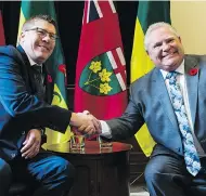  ?? THE CANADIAN PRESS/FILES ?? Ontario Premier Doug Ford, right, and Saskatchew­an Premier Scott Moe are both challengin­g the federal carbon tax in court.