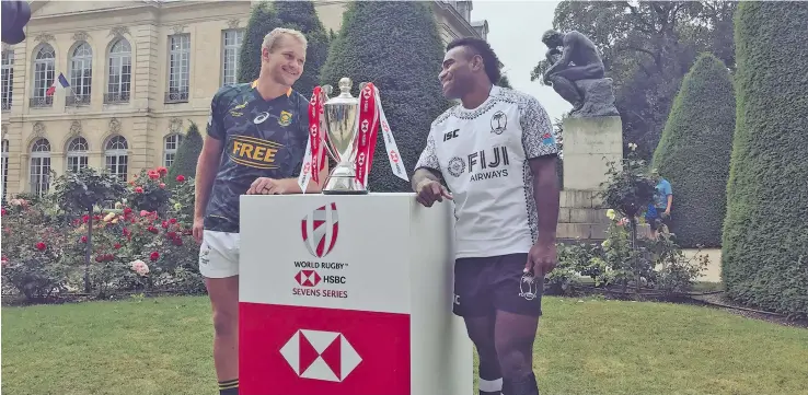  ?? Photo: World Rugby ?? From left South Africa 7s captain Phillip Snyman and Fiji Airways Fijian 7s captain Seremaia Tuwai during the captain’s photo session in Paris, France on June 7, 2018.