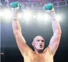  ??  ?? Champ A signed Tyson Fury glove was donated to the charity