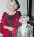  ?? CHRIS JACKSON/ GETTY IMAGES ?? Prodigy Curtis Elton, then nine and in Mozart-era costume,poses with Camilla, Duchess of Cornwall.