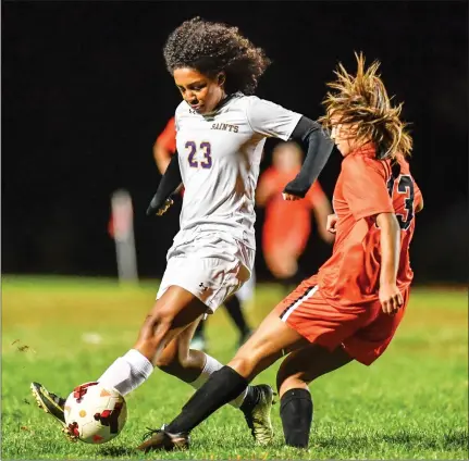  ?? Photos by Jerry Silberman / risportsph­oto.com ?? St. Raphael junior Aliviyah Perryman (23, above), freshman Ariel O’Brien (19, below) and the Saints battled back to earn a 1-1 Division II tie with West Warwick Thursday night. The tie moves the Saints to 2-3-2 heading into today’s home game against Pilgrim.