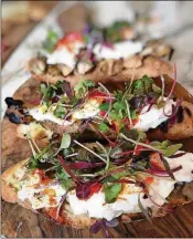  ?? LIZ BALMASEDA / THE PALM BEACH POST ?? During the summer “aperitivo” hours at Sant Ambroeus in Palm Beach, the Burrata Crostone with Eggplant is the dish to order.