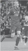  ?? JON SUPER / THE ASSOCIATED PRESS ?? Liverpool’s Fabinho celebrates after scoring Wednesday.