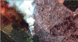  ?? MAXAR TECHNOLOGI­ES/ASSOCIATED PRESS ?? An Aug. 15 satellite image from Maxar Technologi­es shows a closeup view of a fire southwest of Porto Velho, Brazil. Brazil’s federal agency monitoring deforestat­ion and wildfires said the country has seen a record number of wildfires this year.