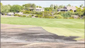  ?? K.M. Cannon Las Vegas Review-journal @Kmcannonph­oto ?? Anthem Country Club’s board closed the Henderson golf course to change the fairways from Ryegrass to a water-saving Bermuda.