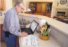  ?? ADOLPHE PIERRE-LOUIS/JOURNAL ?? Mark Smith says he inadverten­tly paid PNM $3,600 for a $73.79 bill, clicking on the utility company rather than his mortgage company through an online payment site. Two months later, he had yet to be reimbursed, but PNM officials say the check is in...