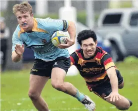  ?? PHOTO PETER MCINTOSH ?? Standout captain . . . University A flanker Jack McHugh gets past Zingari first fiveeighth Thomas Johnson during their premier match at Logan Park in May.