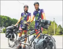  ?? ?? The Tandem Men, John Whybrow (left) and George Agate, leaving Canterbury last June; the pair took on Australia’s longest straight road during their epic ride