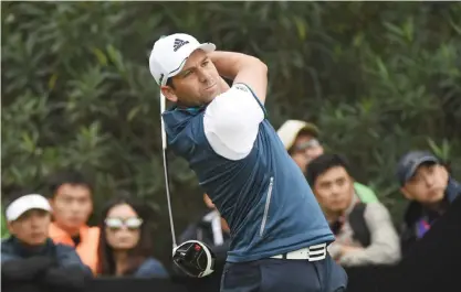  ??  ?? SHANGHAI: Sergio Garcia of Spain tees off during the final round of the WGC-HSBC Champions golf tournament in Shanghai. — AFP