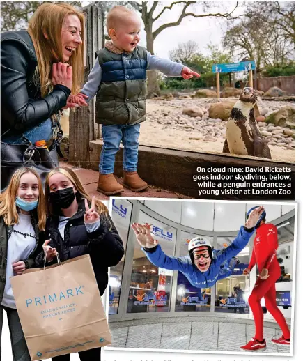  ??  ?? On cloud nine: David Ricketts goes indoor skydiving, below, while a penguin entrances a young visitor at London Zoo