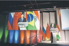  ?? – AFP photo ?? China’s President Xi Jinping addresses delegates at a Business Forum organised during the 10th BRICS (acronym for the grouping of the world’s leading emerging economies, namely Brazil, Russia, India, China and South Africa) summit on July 25, at the...