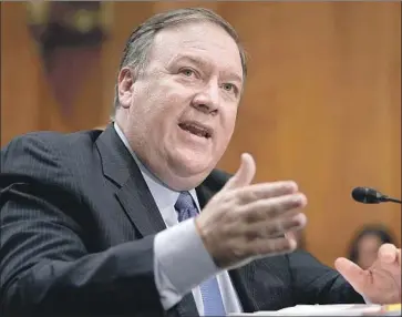  ?? Alex Wong Getty Images ?? SECRETARY OF STATE Michael Pompeo appears before the Senate Foreign Relations Committee. When a senator noted he was avoiding answering a question, he responded that he was addressing “what matters.”