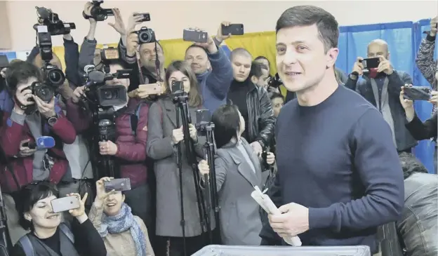  ?? PICTURE: GENYA SAVILOV ?? 0 Ukrainian comic actor, showman and presidenti­al candidate Volodymyr Zelensky casts his vote in a Kiev polling station