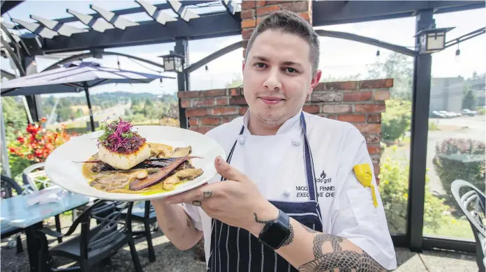  ?? DARREN STONE, TIMES COLONIST ?? Fireside Grill executive chef Nicolas Fennell with a dish entered in this year’s Hungry Hearts competitio­n, Our Place’s annual fundraiser.