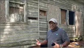  ?? ?? Grant speaks July 11 outside an old Rosenwald School he is trying to raise money to restore in Gifford.