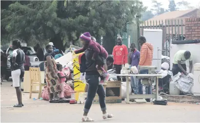  ?? Picture: Nigel Sibanda ?? ANOTHER DAY. Residents of Windsor East flats, along Beatrice Street, were yesterday evicted by the Red Ants. Police said the evictions were above board and that residents were informed in time.