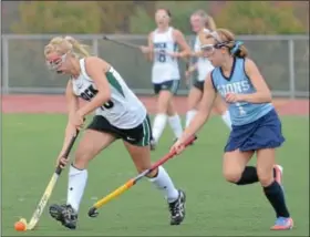  ?? For Montgomery Media / AMANDA PICCIRILLI ?? Christophe­r Dock’s Hannah Bergey tries to get past Lower Moreland defender Samantha McGuigan during the District One Class AA playoffs.