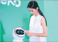  ?? PROVIDED TO CHINA DAILY ?? A sales representa­tive introduces Keeko, made by a company in Xiamen that produces intelligen­t education robots.