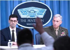  ??  ?? Assistant Secretary of Defence for Internatio­nal Security Affairs Robert Karem (left) and Waidhauser (right), speak during a press briefing at the Pentagon in Washington. — AFP photo