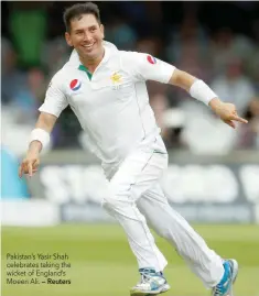  ?? — Reuters ?? Pakistan’s Yasir Shah celebrates taking the wicket of England’s Moeen Ali.