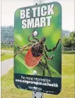  ?? BOB TYMCZYSZYN TORSTAR FILE PHOTO ?? Rotary Park in St. Catharines displays a health department sign advising people to be tick smart in the at-risk area.
