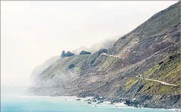  ?? COURTESY OF CALTRANS ?? California Highway 1 as it appeared on June 1 last year after the massive Mud Creek landslide cut the roadway in two. More than 5 million cubic yards of rock and dirt spilled onto the roadway and into the ocean, creating 13 additional acres of...