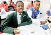  ?? Picture: Nokuthula Mbatha/African News Agency (ANA) ?? FUTURE LOOKS BRIGHT: Kgaogelo Bopape, 15, in Grade 10, and Malwande Nkonyane, 17, in Grade 12, have done their school proud.