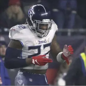  ?? ELISE AMENDOLA - THE ASSOCIATED PRESS ?? Tennessee Titans running back Derrick Henry celebrates his touchdown against the New England Patriots in the first half of an NFL wild-card playoff football game, Saturday, Jan. 4, 2020, in Foxborough, Mass.