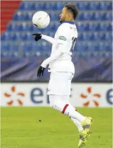  ?? (Photo: AFP) ?? Paris Saint-germain’s Brazilian forward Neymar controls the ball during the French Cup match against Stade Malherbe Caen at Michel-d’ornano Stadium in Caen, north-western France, on Wednesday.