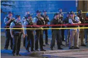  ?? TERRENCE ANTONIO JAMES/CHICAGO TRIBUNE ?? Chicago Police remain at the scene of a shooting near 47th Street and Prairie Avenue in Chicago.