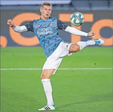  ??  ?? Kroos, antes de la disputa de un partido en Valdebebas a final de temporada.