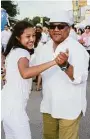  ??  ?? Adriana Cruz dances with her father, Jose Cruz.