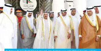  ??  ?? His Highness the Amir Sheikh Sabah Al-Ahmad Al-Jaber Al-Sabah waves at the National Assembly yesterday.