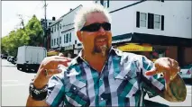  ?? FOOD NETWORK ?? The new Flavortown Kitchen menus from celebrity chef Guy Fieri, shown filming in Boston, have arrived in the Bay Area.