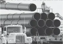  ?? NATI HARNIK/THE ASSOCIATED PRESS FILES ?? The contentiou­s Dakota Access pipeline has drasticall­y shrunk shipping costs for companies in the Bakken oilfield, making them more competitiv­e with their rivals.